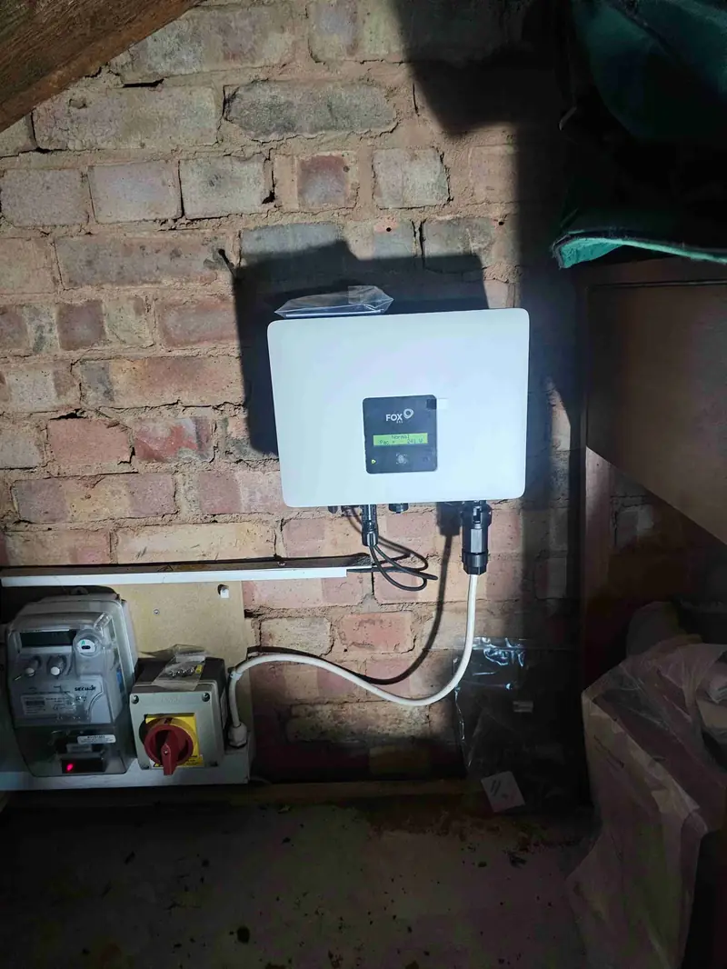 Fox ESS Inverter Mounted on Brick Wall